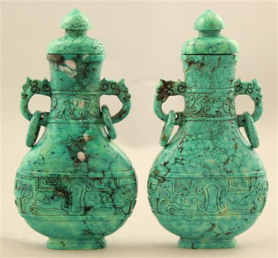 A pair of Chinese stained turquoise vases and covers, 14.8cm